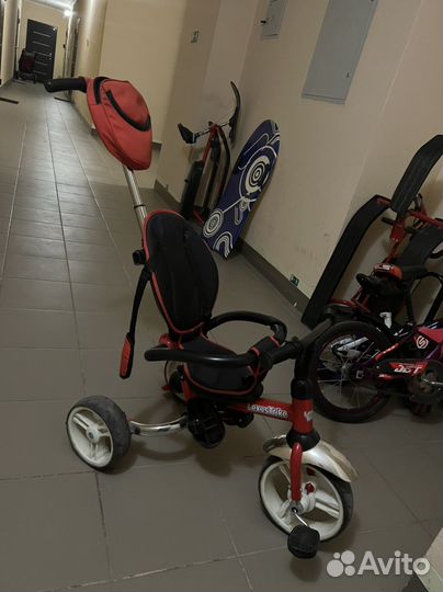 Детский велосипед с ручкой