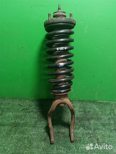 Стойка амортизатора передняя левая Ssangyong Rext