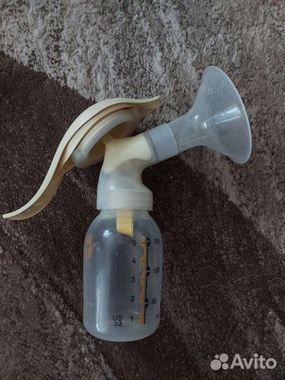 Молокоотсос medela