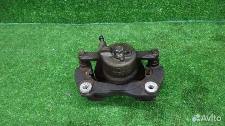 Суппорт передний левый Toyota Corolla Fielder