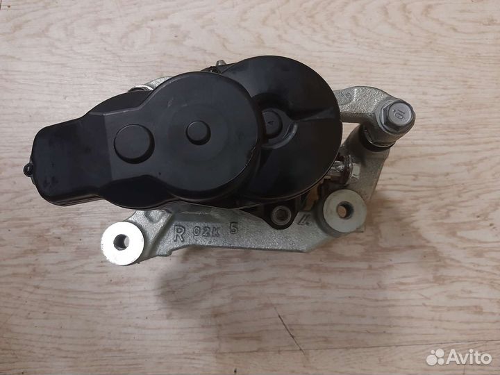 Суппорт тормозной задний правый Mitsubishi