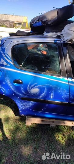 Пежо 206 дверь