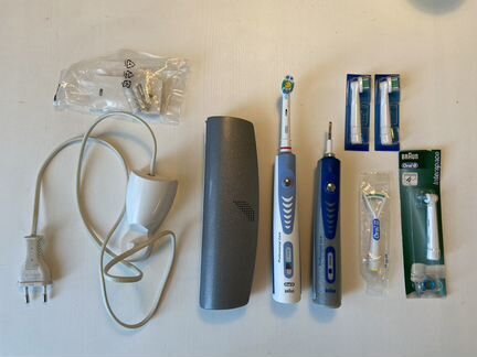 Электрическая зубная щетка oral-b с аксессуарами