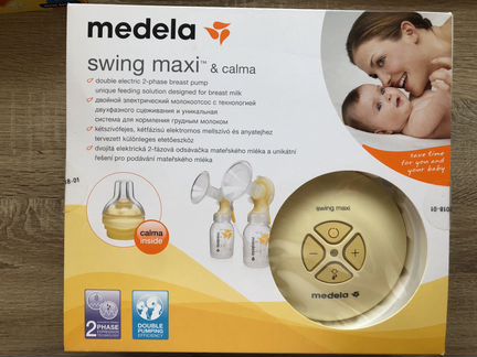 Молокоотсос Medela swing maxi