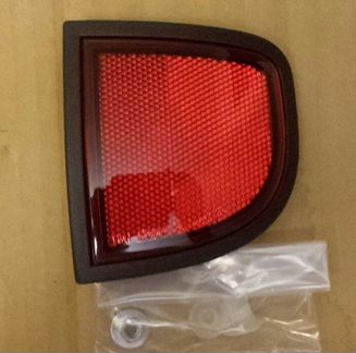 Фонарь катафот в кузов Митсубиси Л 200 L200