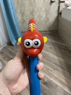 Каталка утка музыкальная