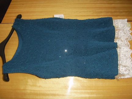 Жилет букле с пайетками новый